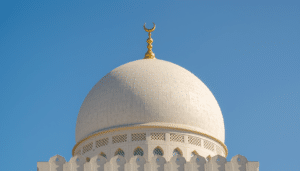 GRC mosque dome installation Dubai - completed project showing Islamic ornamentation and crescent finial.