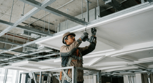 GRG ceiling panel fixing to galvanised suspension system - GRG ceiling installation Dubai